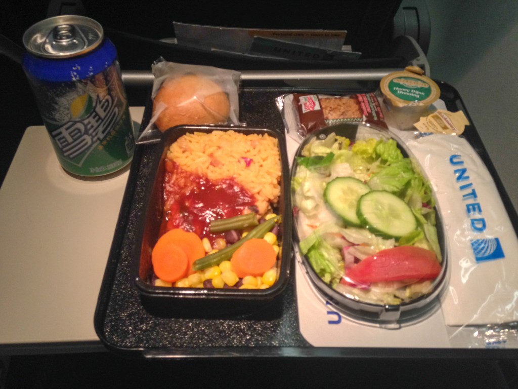 First meal on the flight to Tokyo: chicken curry with Sprite